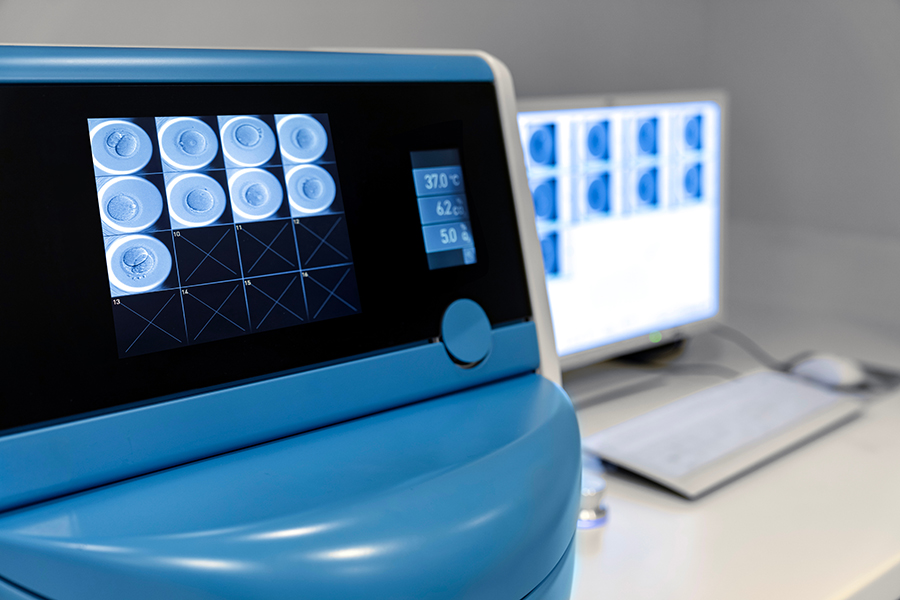 Advanced IVF laboratory technology displaying human embryo devel